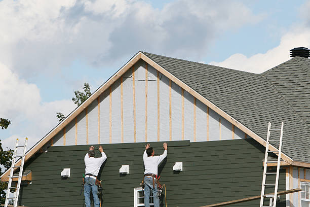 Professional Siding Repair technician working in Hyde Park, MA